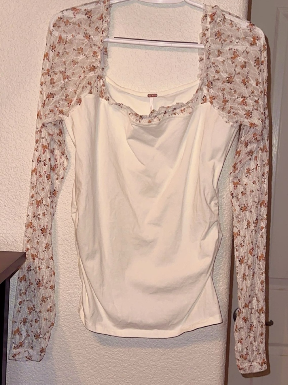Free People’s “Josie Long Sleeve” Women's Top in shade: “Tea Combo”